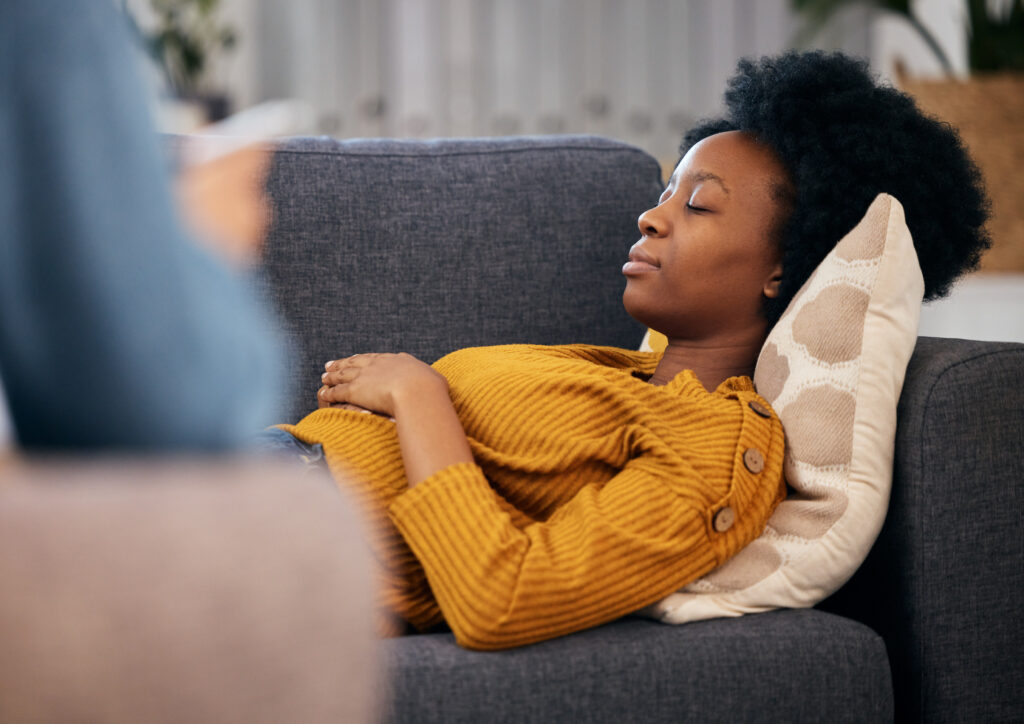 A young woman talking with a counsellor during a mental health session